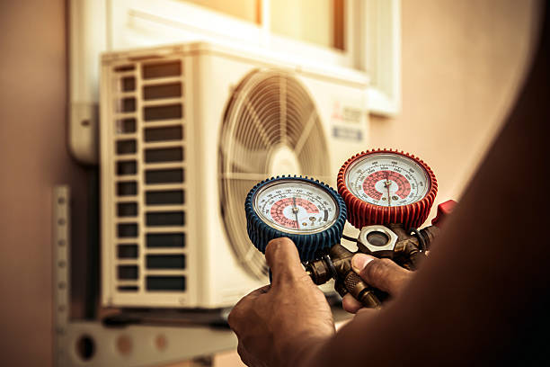 Professional Heat Pump Repair technician working in Mckenna, WA
